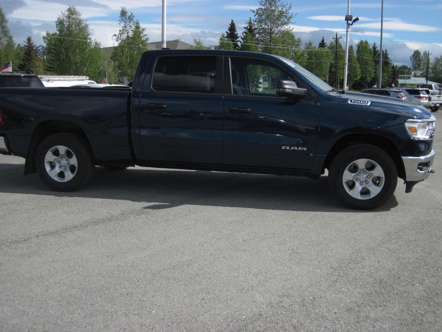 2023 blue /gray RAM 1500 Big Horn Crew Cab 4WD (1C6SRFMTXPN) with an 5.7L V8 OHV 16V engine, 8A transmission, located at 9530 Old Seward Highway, Anchorage, AK, 99515, (907) 349-3343, 61.134140, -149.865570 - Photo#2